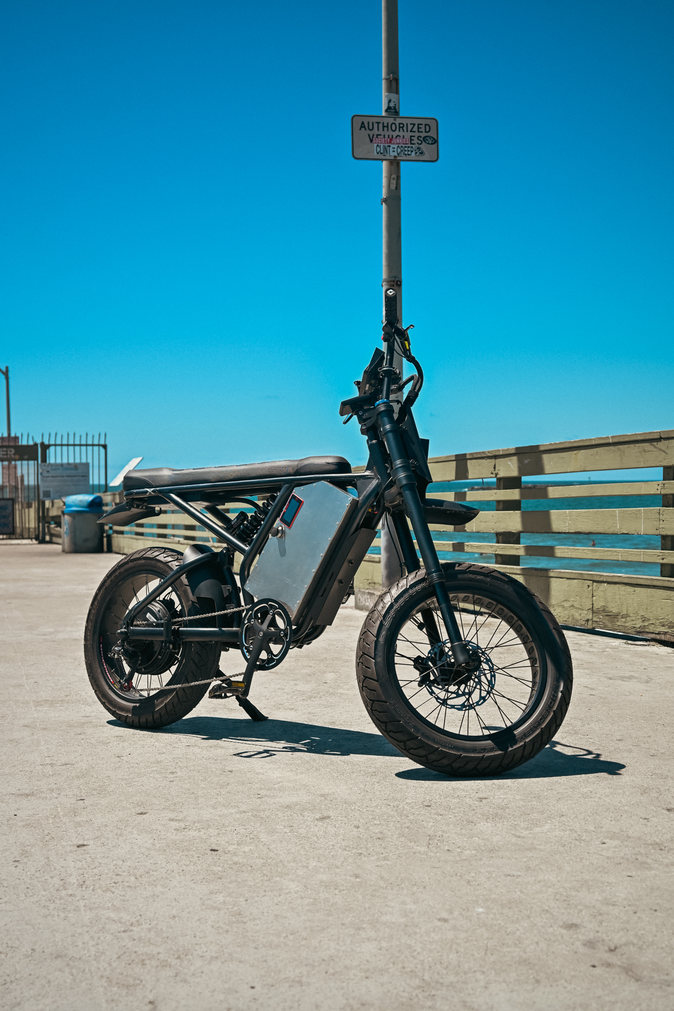 ZR Custom side profile on the pier with Pacific Ocean and blue sky behind