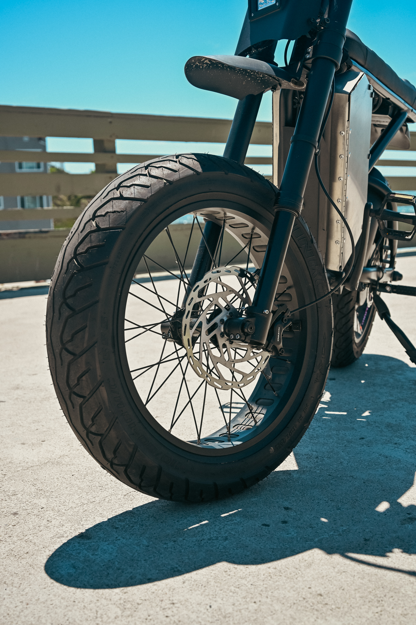 ZR Custom front wheel and disc brake close-up on the pier