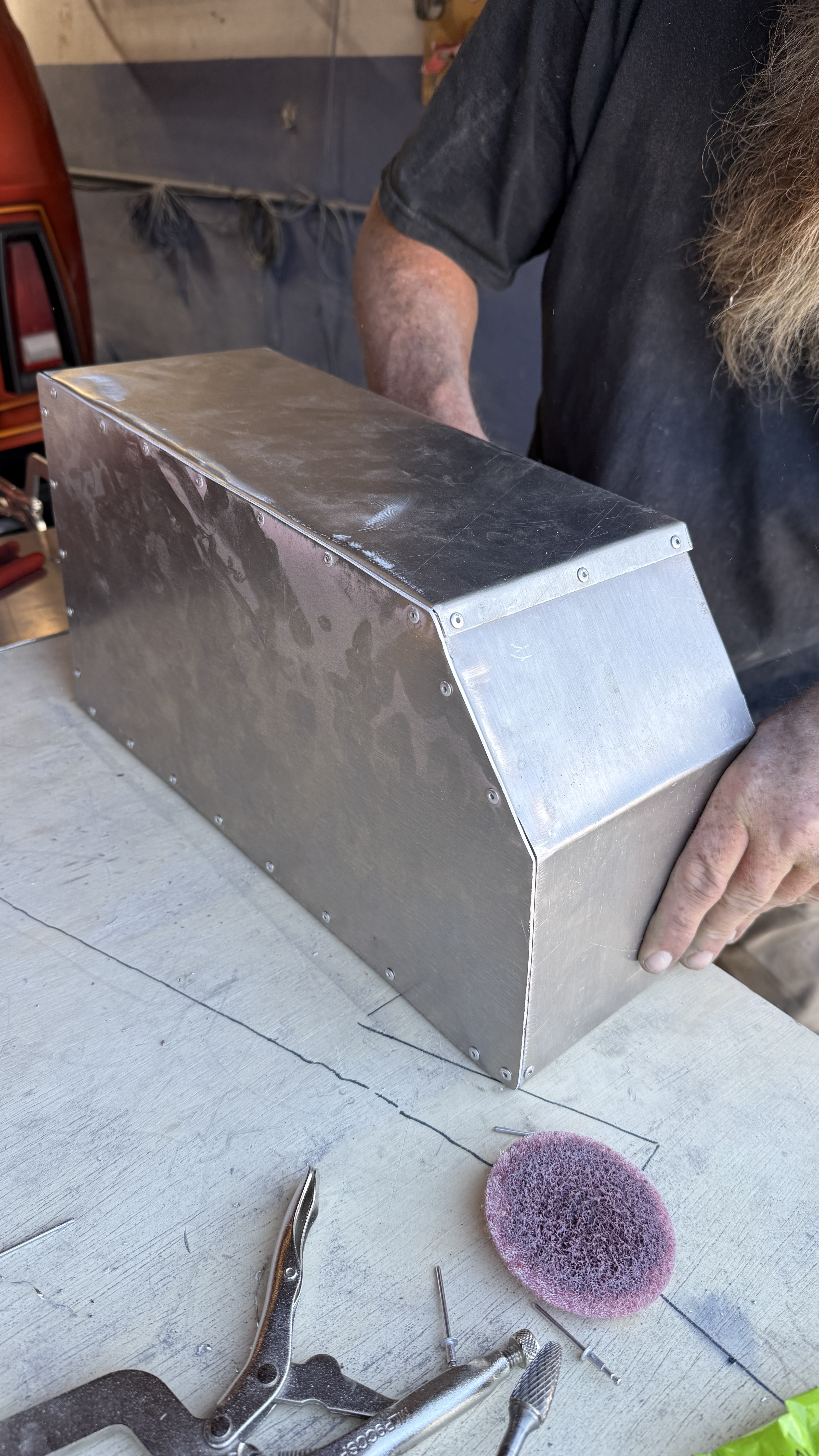 Finished riveted aluminum battery case