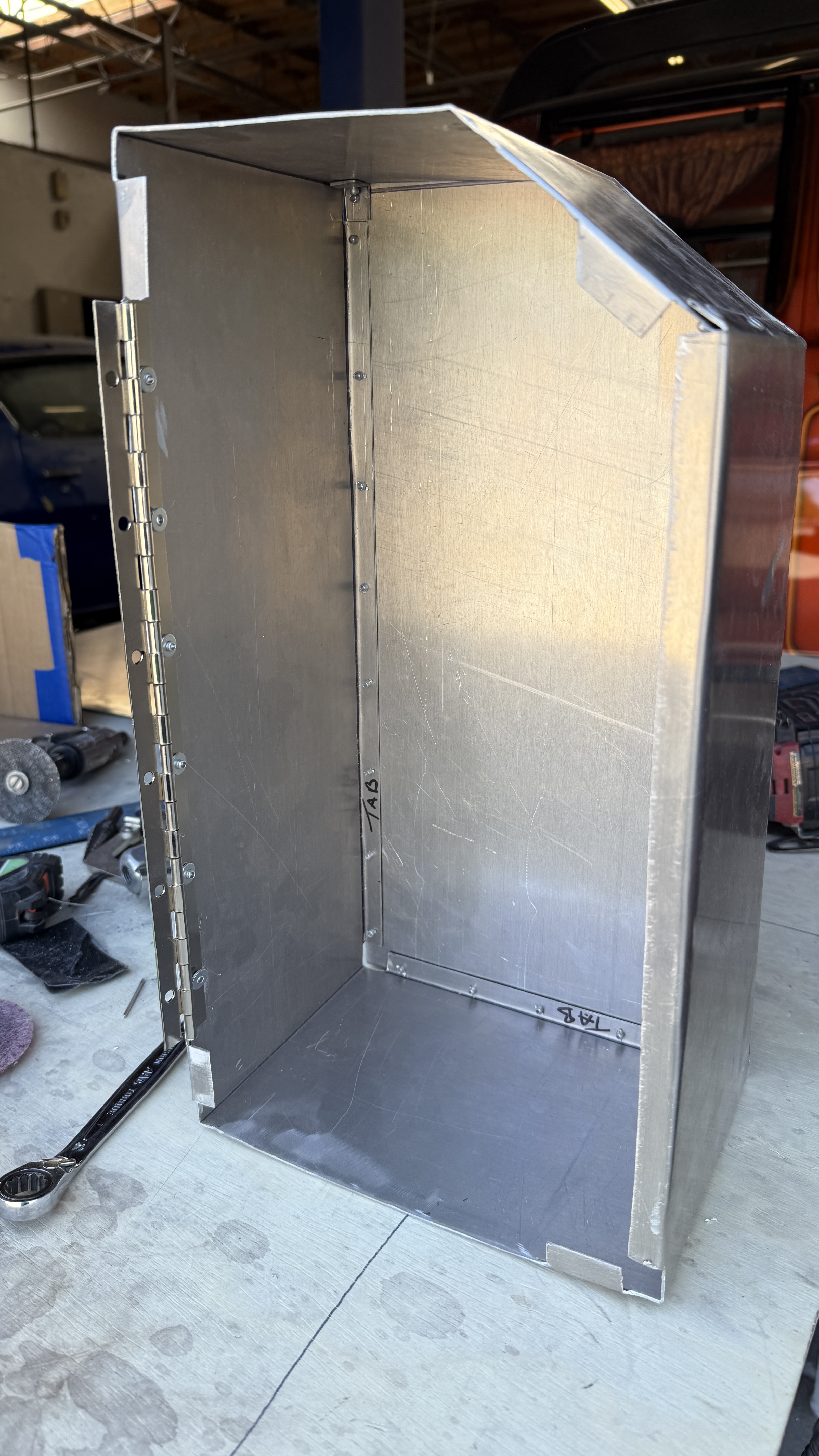 Battery case open showing the interior with hinge