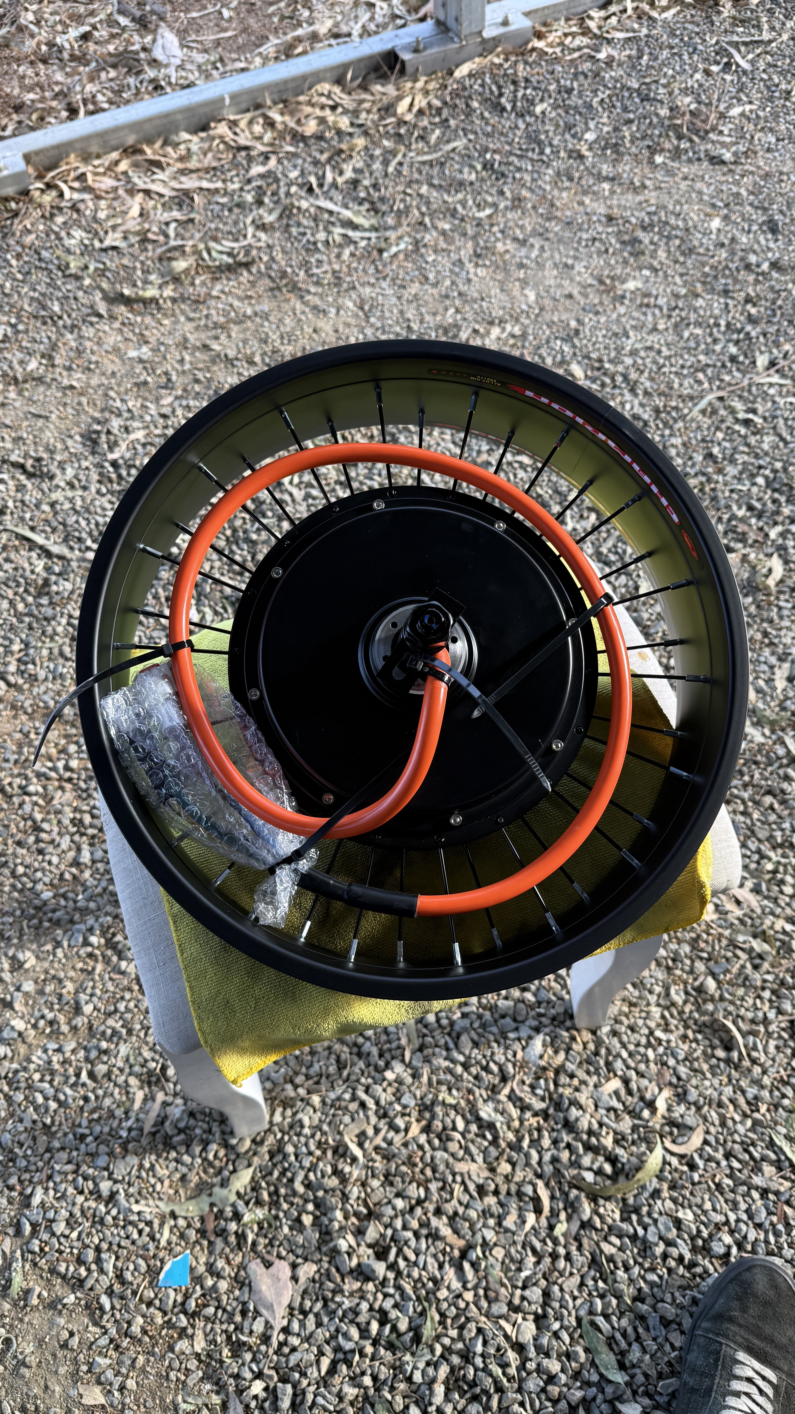 QS205 hub motor laced into a black 16-inch wheel