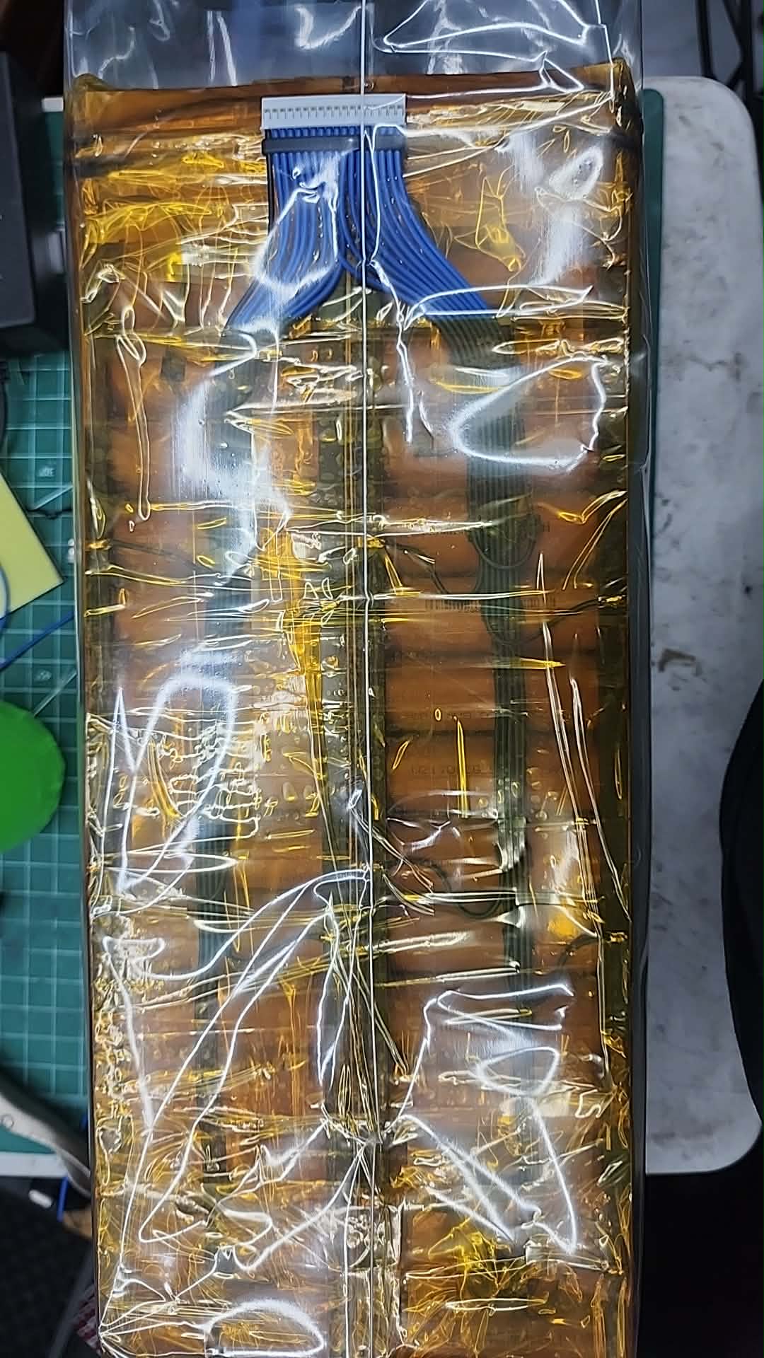 16s14p cell pack wrapped in Kapton tape with blue balance wires