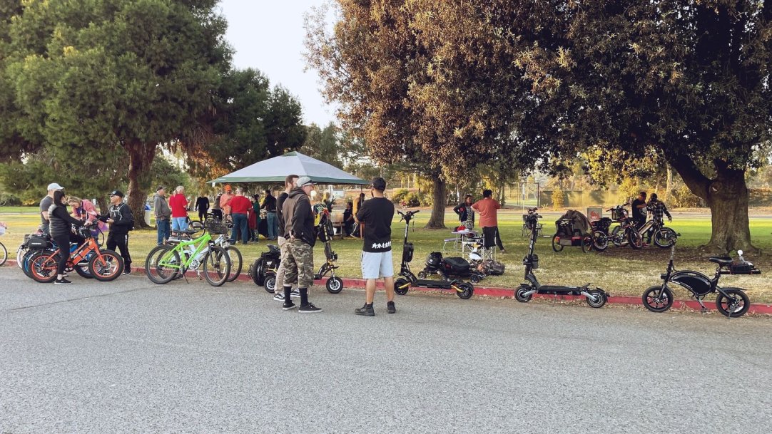 Local PEV riders with e-bikes and e-scooters at a community ride in Temecula